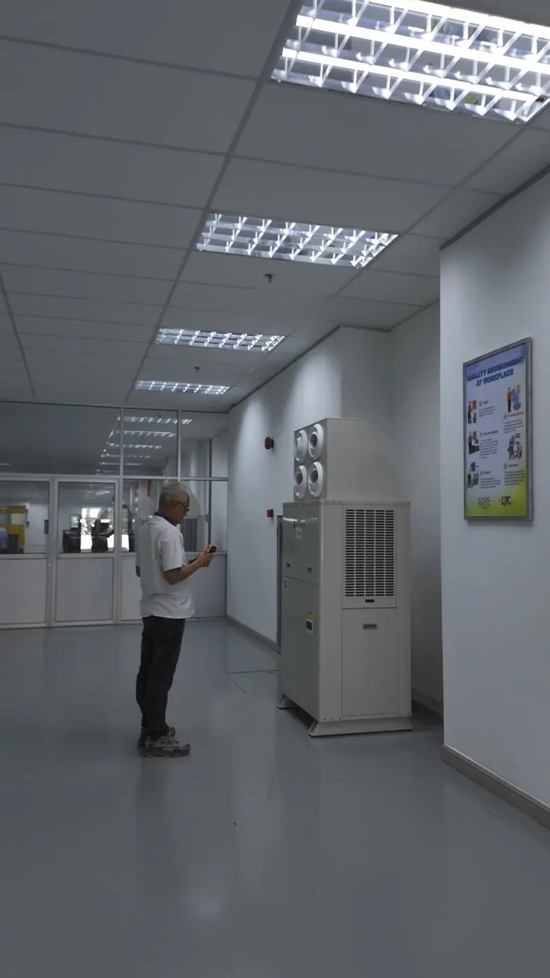 Technician inspecting a unit on site