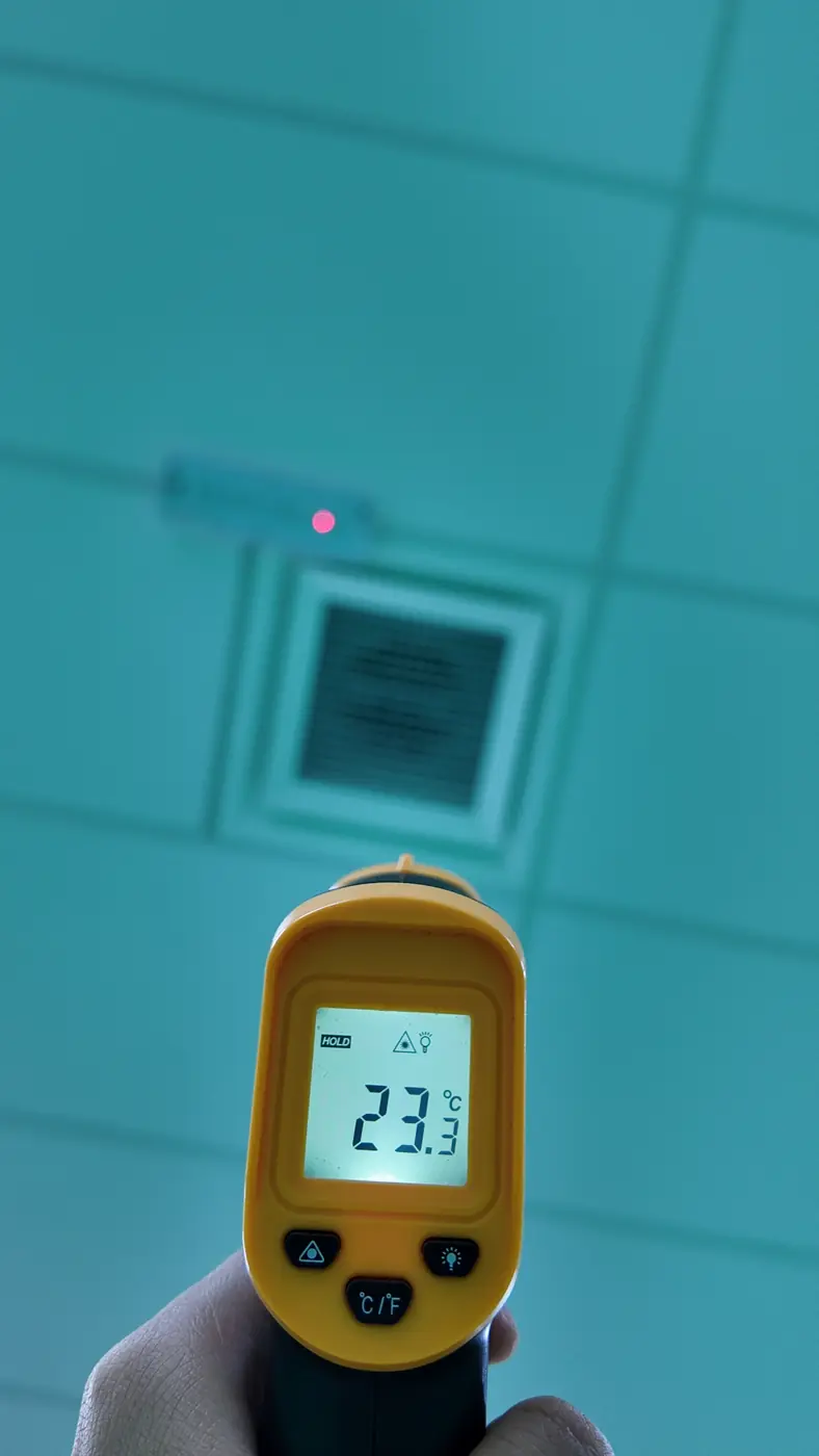 Infrared reading 23.3°C at a vent